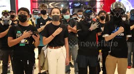 Hand on heart: Hong Kongers sing protest anthem in Yuen Long mall