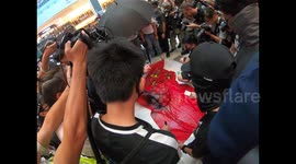Hong Kong protesters trample Chinese flag in New Town Plaza mall