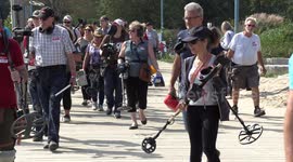 Crowds search for lost treasure on Toronto beach during end of summer party