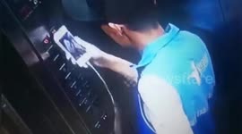 Delivery man spits on control panel in elevator in Beijing