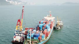 Drone view of a container ship refuelling in Hong Kong