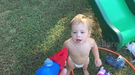 Squirting Water Gun in Baby's mouth