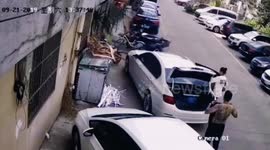 Concrete block narrowly misses man after falling from building in China