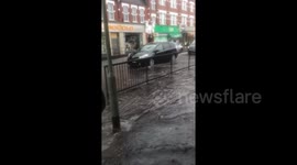 Streets turn into 'rivers' as London faces heavy rain