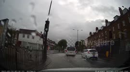 Heavy rain bursts drains in streets of north London