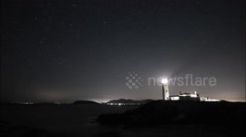Time Lapse of Fanad Head Light House With Stars & Rising Moon