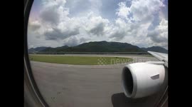 Takeoff from Hong Kong Airport on Boeing 777-300 of Thai Airways