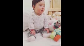 Olvia, an 11-month-old baby with down syndrome is happy to go to sleep