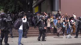 Students and police in Colombia clash for second day running