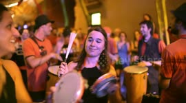 Drumming group play in the streets at the gracia festival in barcelona
