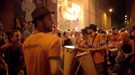 Drumming group play in the streets at the gracia festival in barcelona