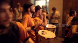 Drumming group play in the streets at the gracia festival in barcelona