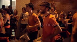 Drumming group play in the streets at the gracia festival in barcelona