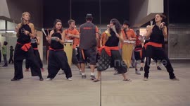 Drumming group play in the streets at the gracia festival in barcelona