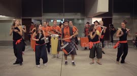 Drumming group play in the streets at the gracia festival in barcelona