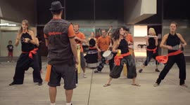 Drumming group play in the streets at the gracia festival in barcelona
