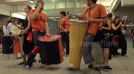 Drumming group play in the streets at the gracia festival in barcelona