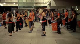 Drumming group play in the streets at the gracia festival in barcelona
