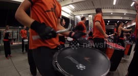 Drumming group play in the streets at the gracia festival in barcelona