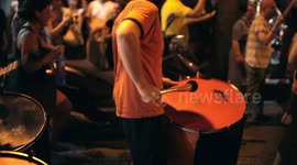Drumming group play in the streets at the gracia festival in barcelona