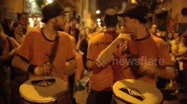 Drumming group play in the streets at the gracia festival in barcelona