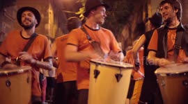 Drumming group play in the streets at the gracia festival in barcelona