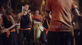 Drumming group play in the streets at the gracia festival in barcelona