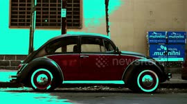 a sequence of 500 volkswagen beetle cars shot from the side in mexico
