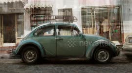 a sequence of 500 volkswagen beetle cars shot from the side in mexico