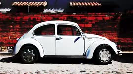 a sequence of 500 volkswagen beetle cars shot from the side in mexico