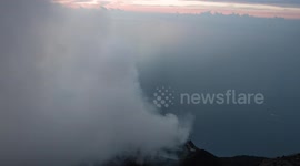 stromboli volcano errupting at night