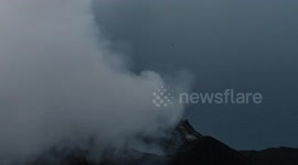 stromboli volcano errupting at night