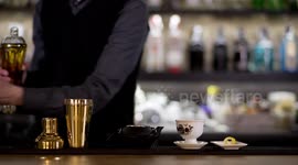 an experimental cocktail waiter makes a special drink in a bar lounge in spain