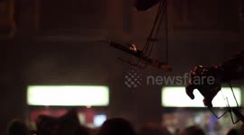 crowds in the street for the fire run or correfoc, during la merce festival, barcelona spain