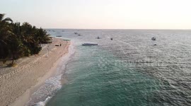 Sunrise on the island of Malapascua (Cebu, Philippines) seen by drone