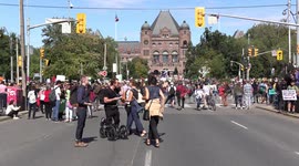 Toronto climate action protest draws tens of thousands of people into the streets demanding action on climate change and global warming