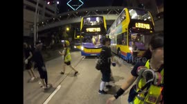 Protesters cut traffic to allow fellow protesters to flee the police