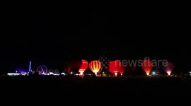 Hot air balloons light up night sky on final day of UK festival