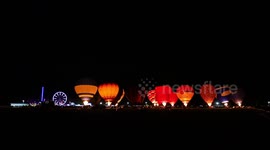 Hot air balloons light up night sky on final day of UK festival