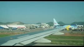 view from the window of airplane taxing in ibiza airport after landing