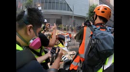 Hong Kong protesters light up bonfire in Wan Chai