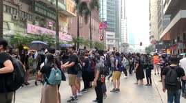 Resourceful Hong Kong activists form human chain to pass supplies to the front line of protest