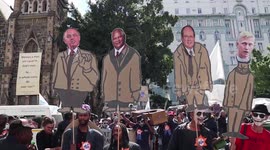 Activists dressed as zombies protest 'apartheid-style' housing policies in Cape Town