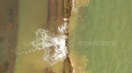 Sea wall flood