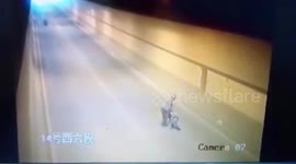 Runaway tyre hits unlucky scooter rider TWICE after falling from truck