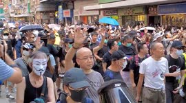 Hong Kong 1st October 2019 - Protesters marching through Wanchai saying Hong Kong people add oil