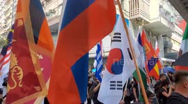 Hong Kong 1st October 2019 protesters chant corrupt police while marching through Wanchai