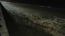 Mountains of sea foam left on Cleethorpes Beach after tidal surge