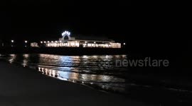 High tide touches the underneath of Cleethorpes Pier