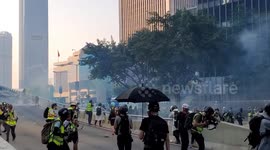First clashes between Hong Kong protesters and riot police on China's National Day